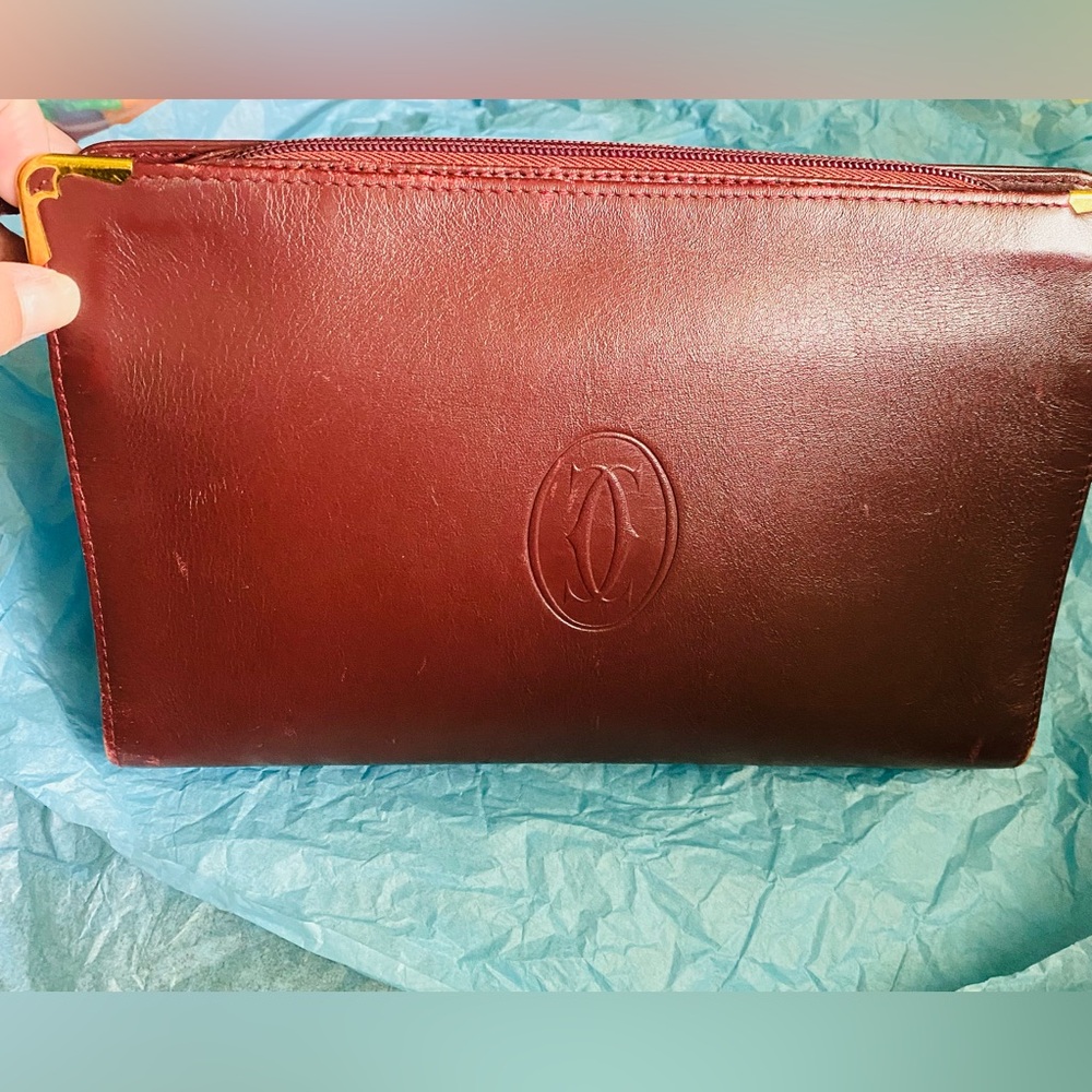 Cartier Burgundy Leather Wristlet Clutch with Gold Trim